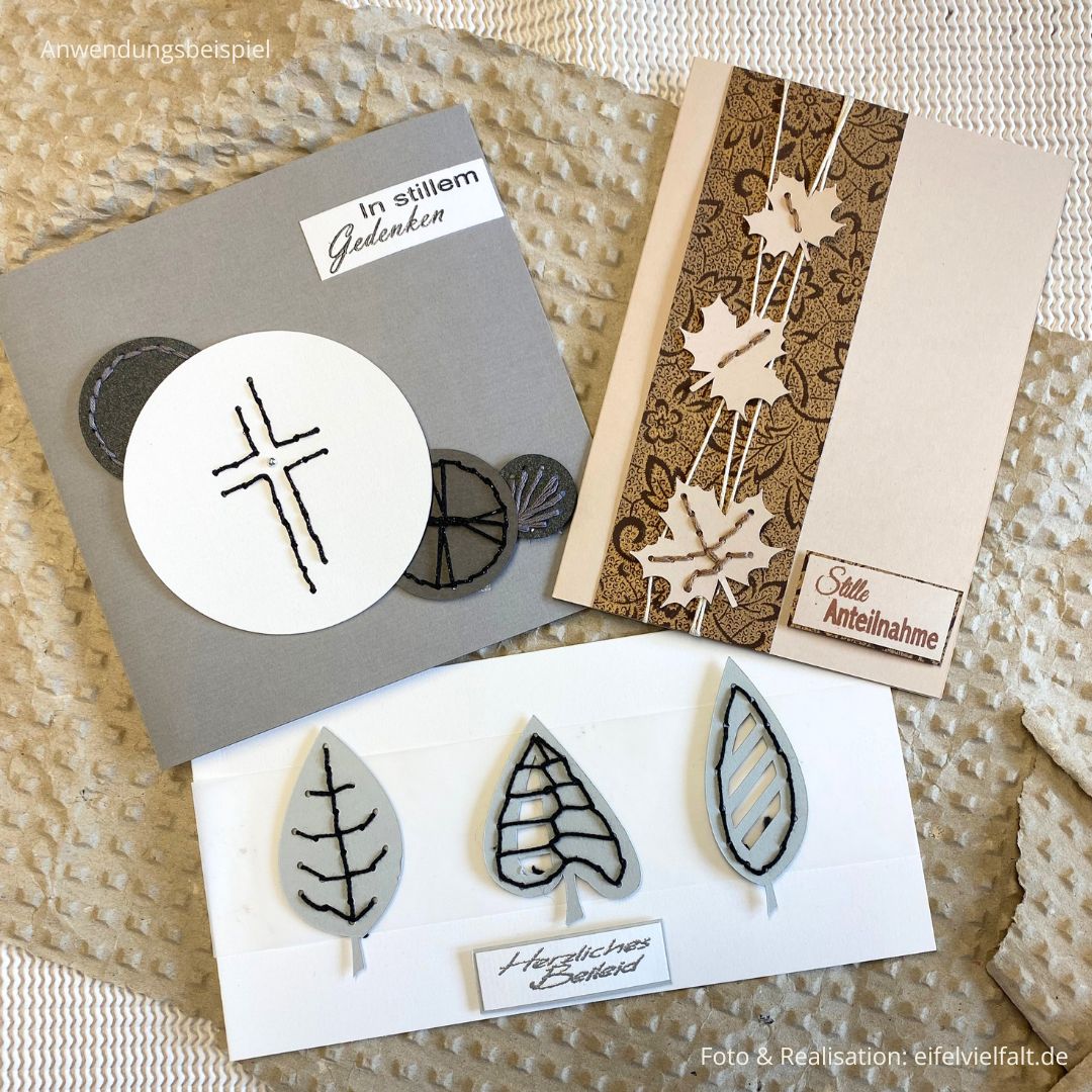 Stick & Papier - DIY-Stickkarten-Set mit 3 Karten in weiß mit grauen Blättern, in beige mit 3 Ahorn-Blättern und in grau mit Kreisen in verschiedenen Größen mit einem Kreuz bestickt